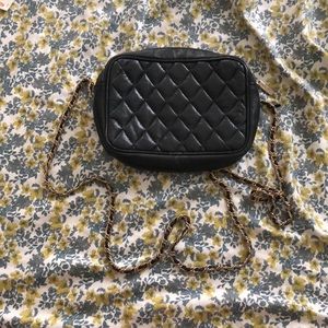 Small crossbody black quilted leather bag